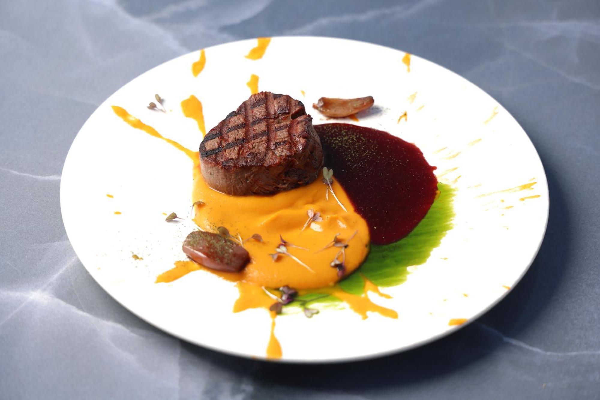 Alia Palace Hotel - Adults Only 16+ Chalkidiki Exterior foto A steak with a pumpkin sauce